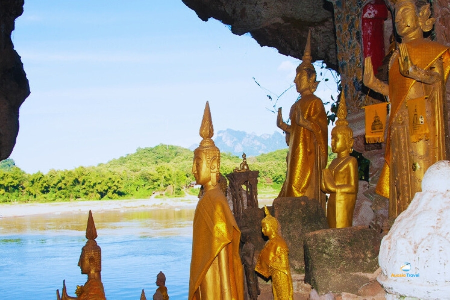Golden Buddha statues inside Pak Ou Caves Luang Prabang Laos – Auasia Travel